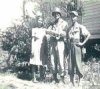 Joel Foster and Ric with wife and baby - click to enlarge