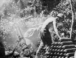 Gun crew firing 4.2-inch mortar in New Guinea during WWII